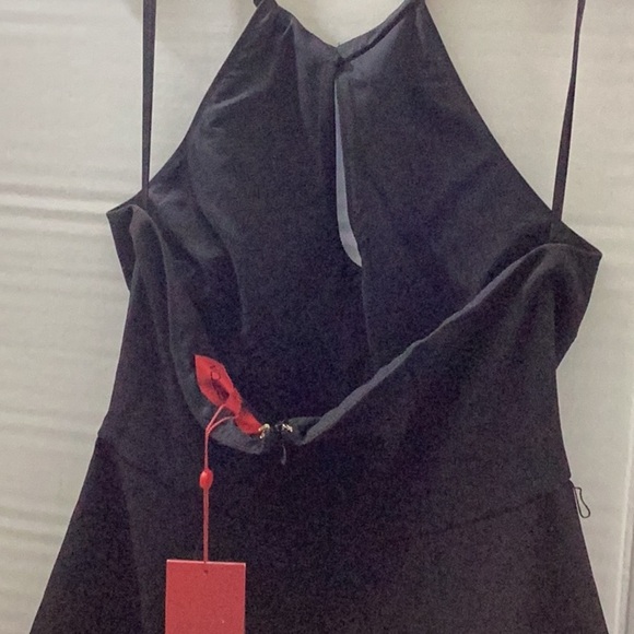 HALSTON
OKI JUMPSUIT IN STRETCH CREPE
$575.00 - Picture 11 of 15